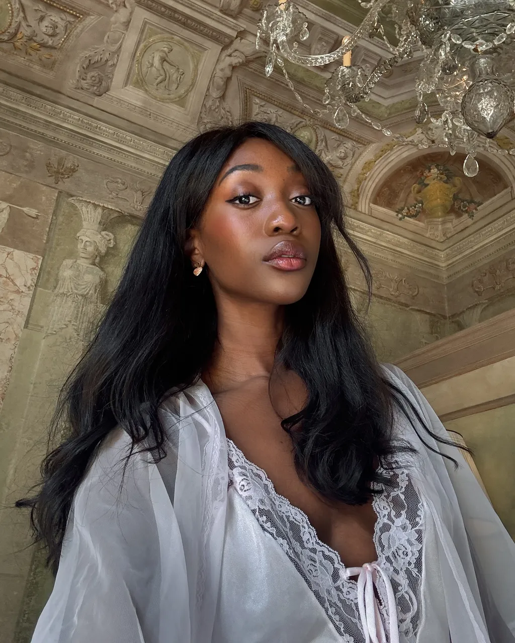 Emmanuelle Koffi wearing a Bardot fringe